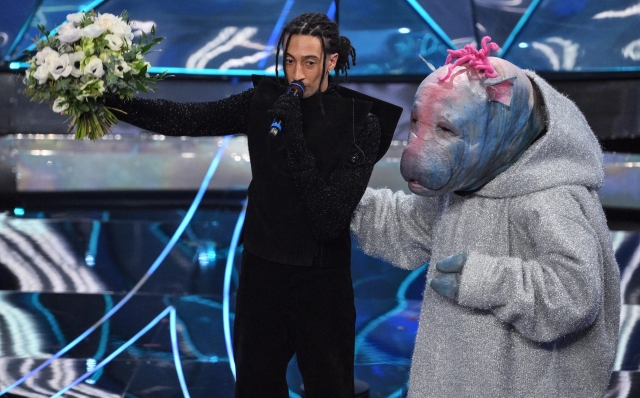 Italian singer Ghali (L) with the puppet Rich Ciolino (R) on stage at the Ariston theatre during the 74th Sanremo Italian Song Festival, Sanremo, Italy, 10 February 2024. The music festival will run from 06 to 10 February 2024.  ANSA/ETTORE FERRARI