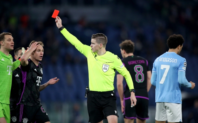 ROME, ITALY - FEBRUARY 14: Dayot Upamecano of Bayern Munich (not pictured) is shown a red card by Francois Letexier during the UEFA Champions League 2023/24 round of 16 first leg match between SS Lazio and FC Bayern München at Stadio Olimpico on February 14, 2024 in Rome, Italy. (Photo by Paolo Bruno/Getty Images)