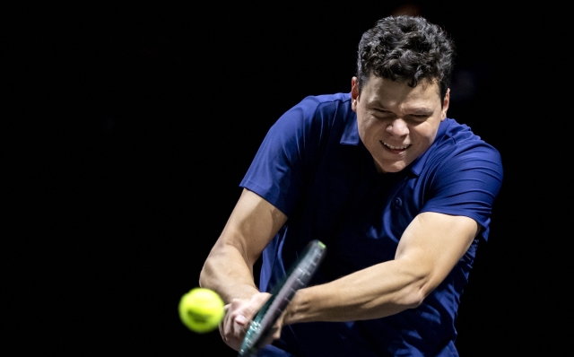 Milos Raonic of Canada returns the ball to Jesper de Jong of Netherlands on the first day of the ABN AMRO Open tennis tournament in Ahoy, on February 12, 2024. (Photo by Sander Koning / ANP / AFP) / Netherlands OUT
