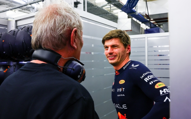BAHRAIN, BAHRAIN - FEBRUARY 21: Max Verstappen of the Netherlands and Oracle Red Bull Racing talks with Red Bull Racing Team Consultant Dr Helmut Marko in the garage during day one of F1 Testing at Bahrain International Circuit on February 21, 2024 in Bahrain, Bahrain. (Photo by Mark Thompson/Getty Images)
