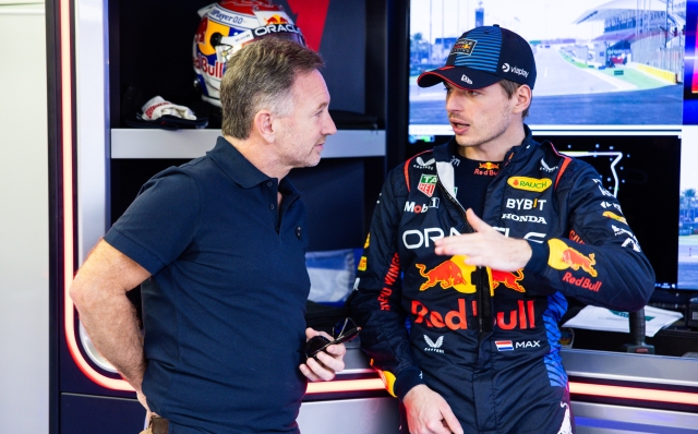 BAHRAIN, BAHRAIN - FEBRUARY 21: Max Verstappen of the Netherlands and Oracle Red Bull Racing talks with Red Bull Racing Team Principal Christian Horner in the garage during day one of F1 Testing at Bahrain International Circuit on February 21, 2024 in Bahrain, Bahrain. (Photo by Mark Thompson/Getty Images)
