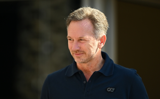 BAHRAIN, BAHRAIN - FEBRUARY 21: Red Bull Racing Team Principal Christian Horner looks on in the Paddock during day one of F1 Testing at Bahrain International Circuit on February 21, 2024 in Bahrain, Bahrain. (Photo by Clive Mason/Getty Images)