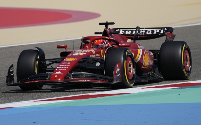 Ferrari driver Charles Leclerc of Monaco steers his car for a Formula One pre season test at the Bahrain International Circuit in Sakhir, Bahrain, Thursday, Feb. 22, 2024. (AP Photo/Darko Bandic)