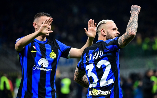 Inter Milan's Italian defender #32 Federico Dimarco celebrates after scoring his team third goal during the Italian Serie A football match between Inter Milan and Atalanta in Milan, on February 28, 2024. (Photo by Piero CRUCIATTI / AFP)