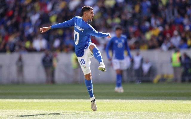 Italy's forward #10 Lorenzo Pellegrini scores his team's first goal during the international friendly football match between Italy and Ecuador at Red Bull Arena in Harrison, New Jersey, on March 24, 2024. (Photo by Charly TRIBALLEAU / AFP)