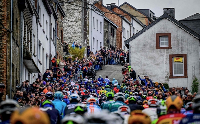 The pack rides during Liege-Bastogne-Liege one day cycling race, 254,5 km round-trip from Liege to Liege via Bastogne, on April 21, 2024. (Photo by DIRK WAEM / Belga / AFP) / Belgium OUT