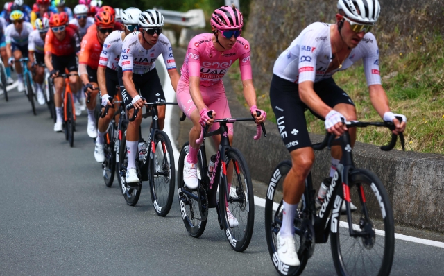 Pink Jersey, Team UAE's Slovenian rider Tadej Pogacar, rides in the pack near Sestri Levante during the 5th stage of the 107th Giro d'Italia cycling race, 178 km between Genova and Lucca, on May 8, 2024. (Photo by Luca Bettini / AFP)