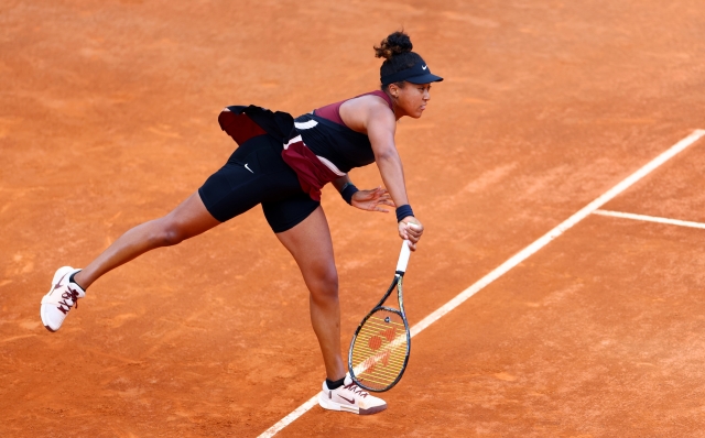 ROME, ITALY - MAY 09: Naomi Osaka of Japan serves against Marta Kostyuk of Ukraine during the Women's Singles Second Round match on Day Four of the Internazionali BNL D'Italia 2024 at Foro Italico on May 09, 2024 in Rome, Italy. (Photo by Dan Istitene/Getty Images)