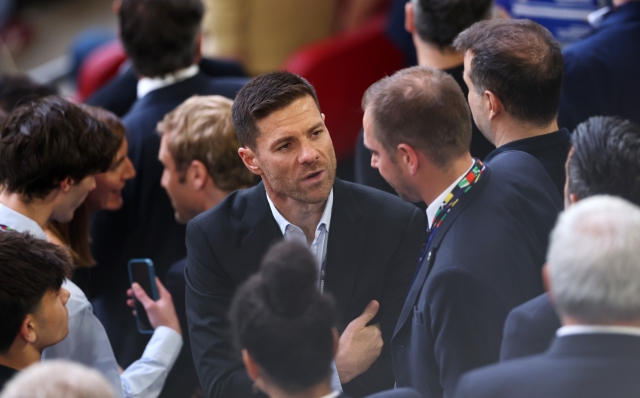 DUSSELDORF, GERMANY - JUNE 17: Xabi Alonso, Head Coach of Bayer 04 Leverkusen, looks on as he interacts with guests prior to the UEFA EURO 2024 group stage match between Austria and France at Düsseldorf Arena on June 17, 2024 in Dusseldorf, Germany. (Photo by Lars Baron/Getty Images)