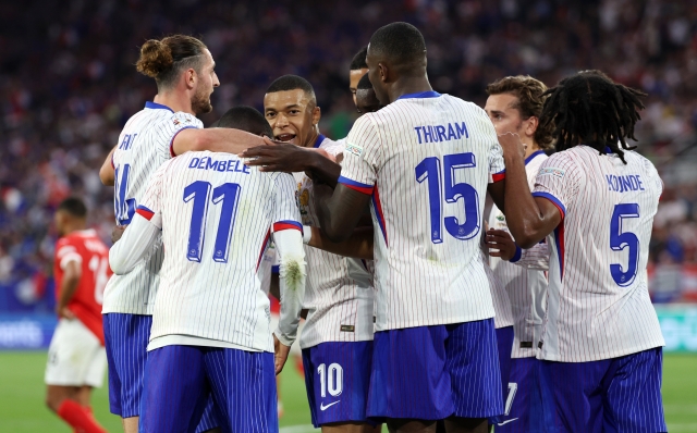 DUSSELDORF, GERMANY - JUNE 17: Kylian Mbappe of France celebrates with teammates after Maximilian Woeber of Austria (not pictured) concedes an own goal after deflecting a cross from Kylian Mbappe in to his own net during the UEFA EURO 2024 group stage match between Austria and France at Düsseldorf Arena on June 17, 2024 in Dusseldorf, Germany. (Photo by Kevin C. Cox/Getty Images)
