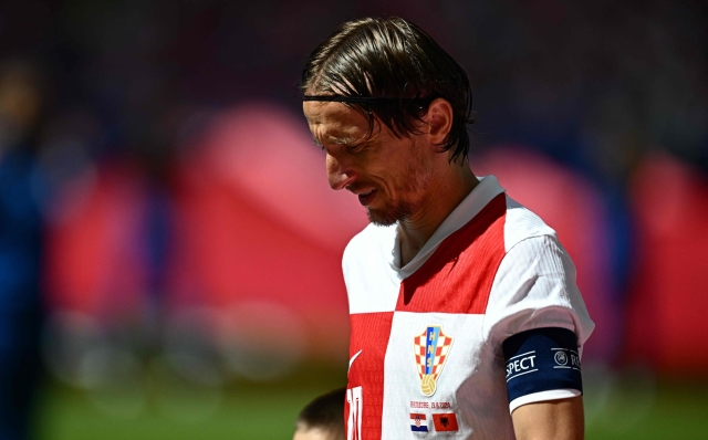 Croatia's midfielder #10 Luka Modric arrives before the start of the UEFA Euro 2024 Group B football match between Croatia and Albania at the Volksparkstadion in Hamburg on June 19, 2024. (Photo by GABRIEL BOUYS / AFP)