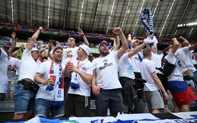 MUNICH, GERMANY - JUNE 20: Fans of Slovenia enjoy the pre match atmosphere prior to the UEFA EURO 2024 group stage match between Slovenia and Serbia at Munich Football Arena on June 20, 2024 in Munich, Germany. (Photo by Shaun Botterill/Getty Images)