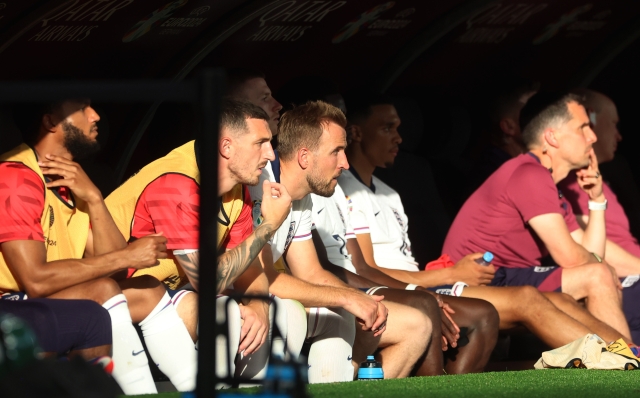 FRANKFURT AM MAIN, GERMANY - JUNE 20: Harry Kane of England looks on from the bench after being substituted during the UEFA EURO 2024 group stage match between Denmark and England at Frankfurt Arena on June 20, 2024 in Frankfurt am Main, Germany. (Photo by Richard Pelham/Getty Images)