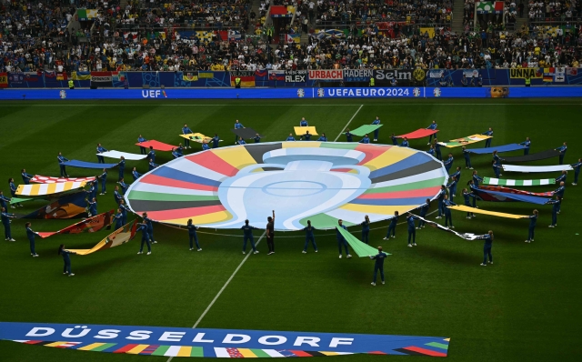 Flag show prior to the UEFA Euro 2024 Group E football match between Slovakia and Ukraine at the Duesseldorf Arena in Duesseldorf on June 21, 2024. (Photo by OZAN KOSE / AFP)