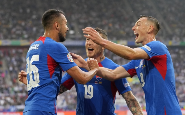 Slovakia's Ivan Schranz celebrates after scoring his side's opening goal during a Group E match between Slovakia and Ukraine at the Euro 2024 soccer tournament in Duesseldorf, Germany, Friday, June 21, 2024. (AP Photo/Andreea Alexandru)