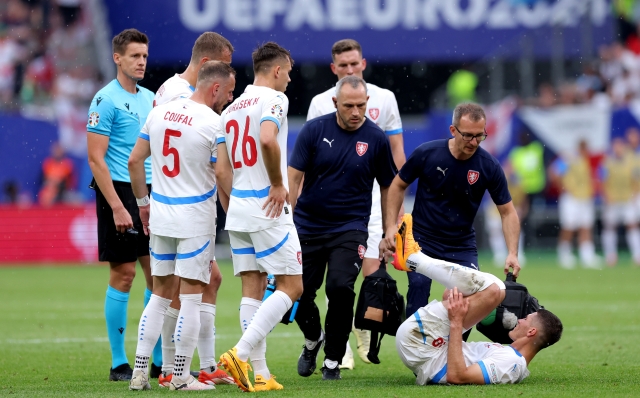 HAMBURG, GERMANY - JUNE 22: Ladislav Krejci of Czechia receives medical treatment to an injury during the UEFA EURO 2024 group stage match between Georgia and Czechia at Volksparkstadion on June 22, 2024 in Hamburg, Germany. (Photo by Alex Livesey/Getty Images)