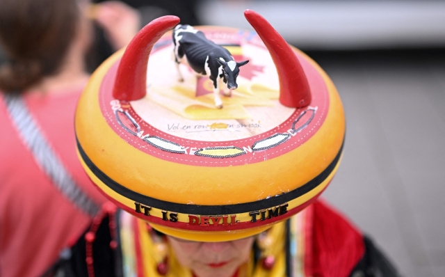 A Belgium's supporter shows their hat as they arrive before the start of the UEFA Euro 2024 Group E football match between Belgium and Romania at the Cologne Stadium in Cologne on June 22, 2024. (Photo by Kirill KUDRYAVTSEV / AFP)