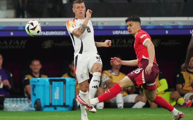 Germany's Toni Kroos fight for the ball with Switzerland's Fabian Rieder  during  the Euro 2024 soccer match between Switzerland and Germany  at the Frankfurt Arena , Frankfurt , Germany - Sunday 23 June  2024. Sport - Soccer . (Photo by Spada/LaPresse)