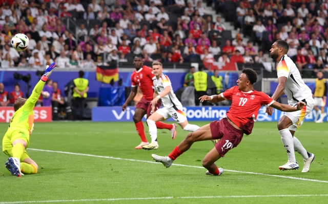 FRANKFURT AM MAIN, GERMANY - JUNE 23: Dan Ndoye of Switzerland scores his team's first goal during the UEFA EURO 2024 group stage match between Switzerland and Germany at Frankfurt Arena on June 23, 2024 in Frankfurt am Main, Germany. (Photo by Stu Forster/Getty Images)