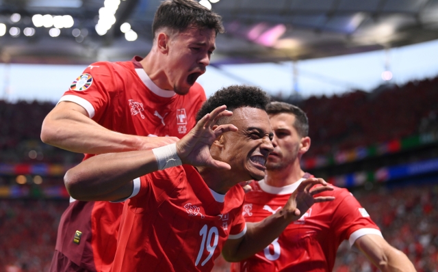 FRANKFURT AM MAIN, GERMANY - JUNE 23: Dan Ndoye of Switzerland celebrates scoring his team's first goal with teammates during the UEFA EURO 2024 group stage match between Switzerland and Germany at Frankfurt Arena on June 23, 2024 in Frankfurt am Main, Germany. (Photo by Stu Forster/Getty Images)