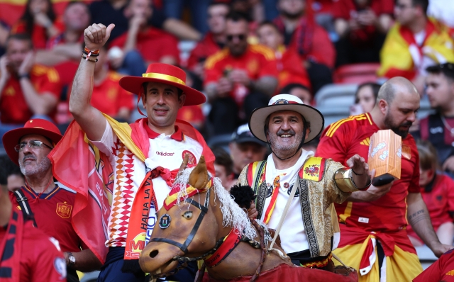 DUSSELDORF, GERMANY - JUNE 24: Fans of Spain pose for a photo as they enjoy the pre match atmosphere prior to the UEFA EURO 2024 group stage match between Albania and Spain at Düsseldorf Arena on June 24, 2024 in Dusseldorf, Germany. (Photo by Kevin C. Cox/Getty Images)