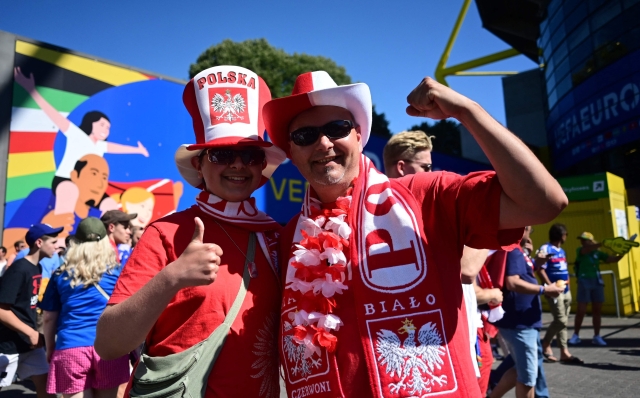 Supporters of Poland are pictured prior the UEFA Euro 2024 Group D football match between France and Poland at the BVB Stadion in Dortmund on June 25, 2024. (Photo by INA FASSBENDER / AFP)