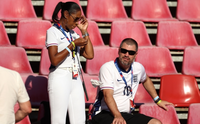 COLOGNE, GERMANY - JUNE 25: Denise Bellingham, Mother of Jude Bellingham, and Mark Bellingham, Father of Jude Bellingham, look on prior to the UEFA EURO 2024 group stage match between England and Slovenia at Cologne Stadium on June 25, 2024 in Cologne, Germany. (Photo by Richard Pelham/Getty Images)