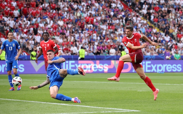 BERLIN, GERMANY - JUNE 29: Remo Freuler of Switzerland scores his team's first goal during the UEFA EURO 2024 round of 16 match between Switzerland and Italy at Olympiastadion on June 29, 2024 in Berlin, Germany. (Photo by Alex Grimm/Getty Images)