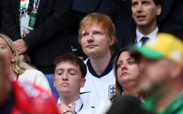 GELSENKIRCHEN, GERMANY - JUNE 30: Ed Sheeran, Singer and songwriterlooks on from the stands prior to the UEFA EURO 2024 round of 16 match between England and Slovakia at Arena AufSchalke on June 30, 2024 in Gelsenkirchen, Germany. (Photo by Richard Pelham/Getty Images)