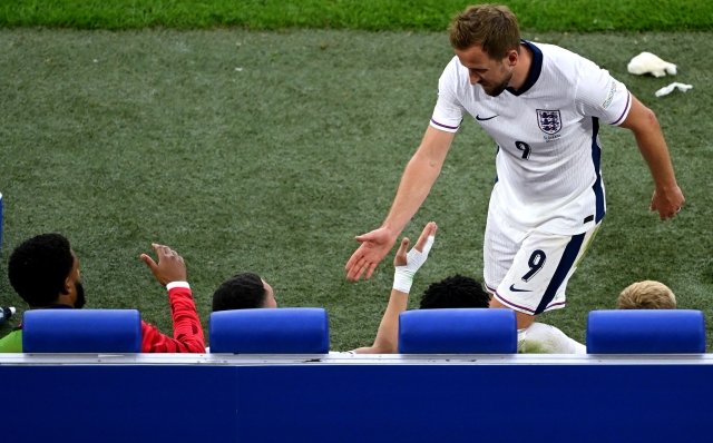 GELSENKIRCHEN, GERMANY - JUNE 30: Harry Kane of England interacts with the bench after being substituted off in extra-time during the UEFA EURO 2024 round of 16 match between England and Slovakia at Arena AufSchalke on June 30, 2024 in Gelsenkirchen, Germany. (Photo by Shaun Botterill/Getty Images)