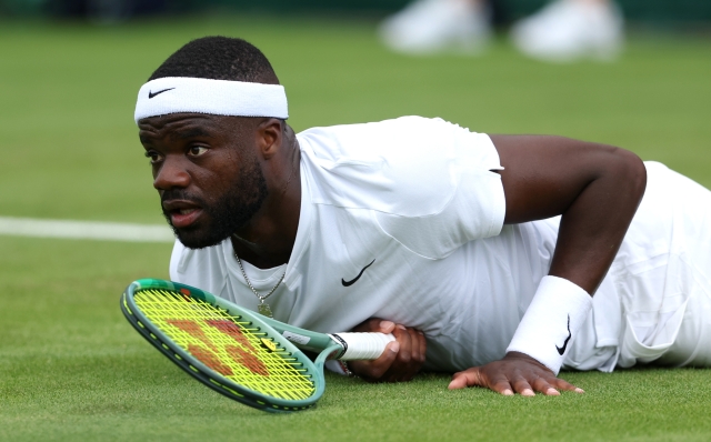 LONDON, ENGLAND - JULY 01: Frances Tiafoe of United States looks on after falling in the Gentlemen's Singles first round match against Matteo Arnaldi of Italy during day one of The Championships Wimbledon 2024 at All England Lawn Tennis and Croquet Club on July 01, 2024 in London, England. (Photo by Julian Finney/Getty Images)