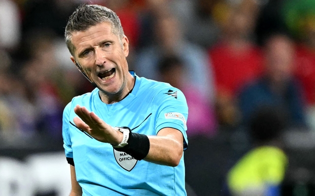 Italian referee Daniele Orsato  reacts  during the UEFA Euro 2024 round of 16 football match between Portugal and Slovenia at the Frankfurt Arena in Frankfurt am Main on July 1, 2024. (Photo by PATRICIA DE MELO MOREIRA / AFP)
