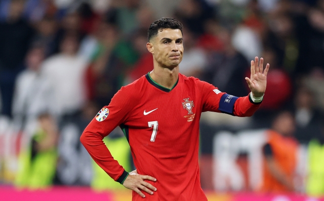 FRANKFURT AM MAIN, GERMANY - JULY 01: Cristiano Ronaldo of Portugal gestures as he reacts ahead of the second half of extra-time during the UEFA EURO 2024 round of 16 match between Portugal and Slovenia at Frankfurt Arena on July 01, 2024 in Frankfurt am Main, Germany. (Photo by Lars Baron/Getty Images)