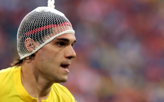 epa11452780 Ianis Hagi of Romania with a head bandage during the UEFA EURO 2024 Round of 16 soccer match between Romania and Netherlands, in Munich, Germany, 02 July 2024.  EPA/FRIEDEMANN VOGEL