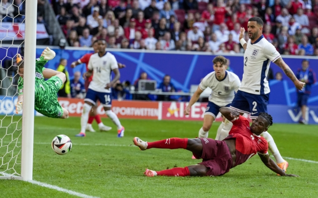 Switzerland's Breel Embolo scores the opening goal during the quarterfinal match between England and Switzerland at the Euro 2024 soccer tournament in Duesseldorf, Germany, Saturday, July 6, 2024. (AP Photo/Frank Augstein)