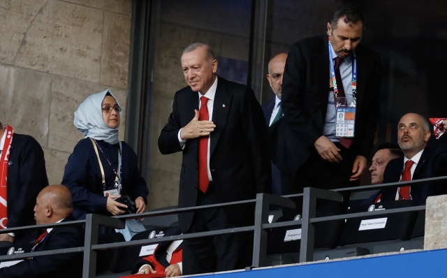 Turkey's President Recep Tayyip Erdogan arrives for the UEFA Euro 2024 quarter-final football match between the Netherlands and Turkey at the Olympiastadion in Berlin on July 6, 2024. (Photo by Odd ANDERSEN / AFP)