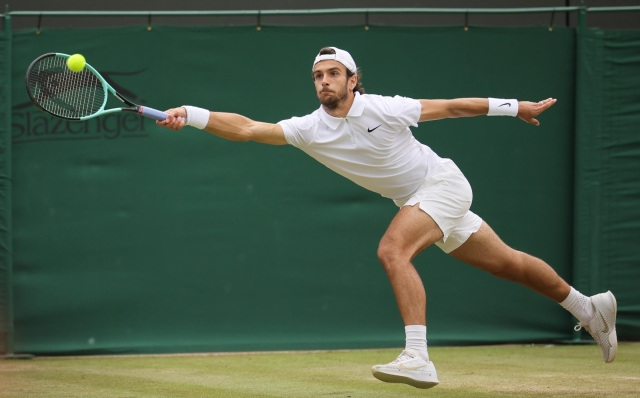 epa11466610 Lorenzo Musetti of Italy in action during his Men's 4th round match against Giovanni Mpetshi Perricard of France at the Wimbledon Championships, in Wimbledon, London, Britain, 08 July 2024.  EPA/TIM IRELAND  EDITORIAL USE ONLY