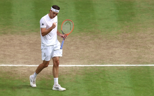 LONDON, ENGLAND - JULY 10: Taylor Fritz of United States celebrates as he plays against Lorenzo Musetti of Italy in the Gentlemen's Singles Quarter Final match during day ten of The Championships Wimbledon 2024 at All England Lawn Tennis and Croquet Club on July 10, 2024 in London, England. (Photo by Sean M. Haffey/Getty Images)