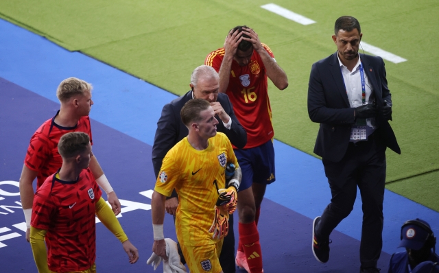 BERLIN, GERMANY - JULY 14: Rodri of Spain reacts as he leaves the field at half time during the UEFA EURO 2024 final match between Spain and England at Olympiastadion on July 14, 2024 in Berlin, Germany. (Photo by Alex Grimm/Getty Images)