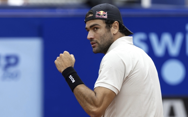 Italy's Matteo Berrettini celebrates making a point against France's Quentin Halys during the men's singles final of the Swiss Open tennis tournament in Gstaad, Switzerland, Sunday, July 21, 2024. (Peter Klaunzer/Keystone via AP)