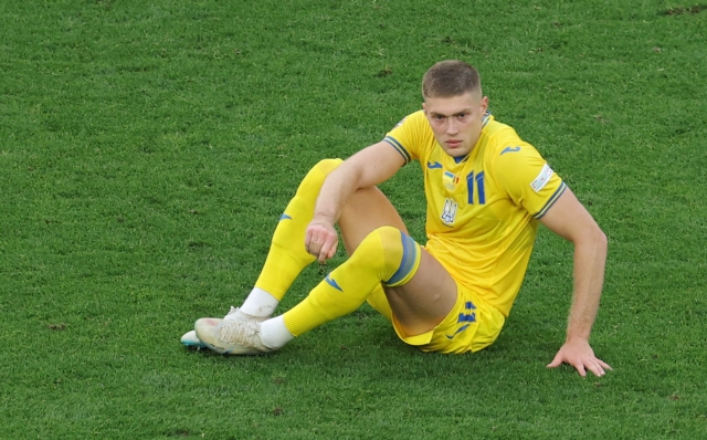 Ukraine's forward #11 Artem Dovbyk reacts after the UEFA Euro 2024 Group E football match between Ukraine and Belgium at the Stuttgart Arena in Stuttgart on June 26, 2024. (Photo by LLUIS GENE / AFP)