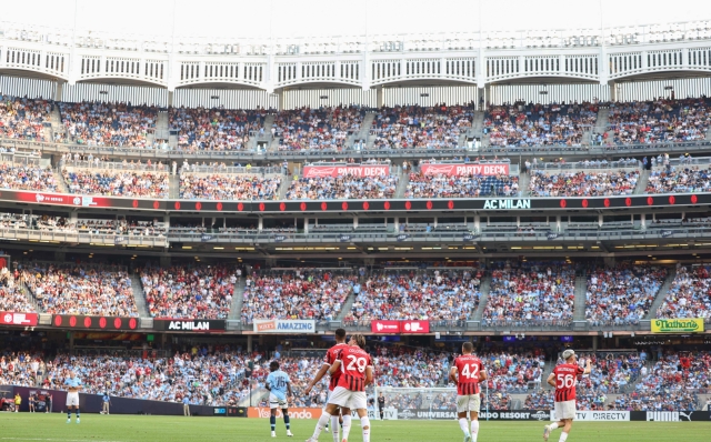 AC Milan's Italian forward #29 Lorenzo Colombo celebrates after scoring during a pre-season club friendly football match between Manchester City and AC Milan at Yankee Stadium in New York on July 27, 2024. (Photo by Charly TRIBALLEAU / AFP)