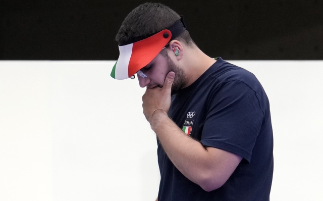 Italy's Frederico Nilo Maldini gestures as he competes in the 10m air pistol men's final at the 2024 Summer Olympics, Sunday, July 28, 2024, in Chateauroux, France. (AP Photo/Manish Swarup)