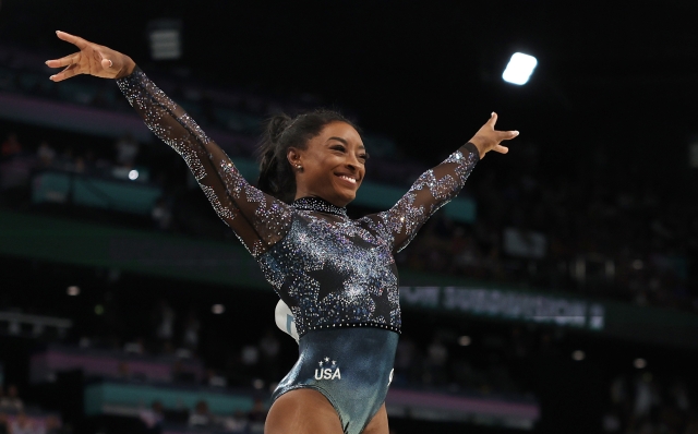 PARIS, FRANCE - JULY 28: Simone Biles of Team United States reacts after competing on the vault during the Artistic Gymnastics Women's Qualification on day two of the Olympic Games Paris 2024 at Bercy Arena on July 28, 2024 in Paris, France. (Photo by Jamie Squire/Getty Images)