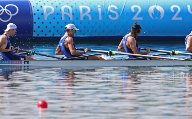epa11508292 Matteo Lodo, Givanni Abagnale, Giuseppe Vicino and Nicholas Kohl of Italy in action during the Men Men Four Repechages of the Rowing competitions in the Paris 2024 Olympic Games, at the Vaires-sur-Marne Nautical Stadium in Vaires-sur-Marne, France, 30 July 2024.  EPA/ALI HAIDER
