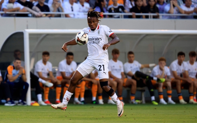 CHICAGO, ILLINOIS - JULY 31: Samuel Chukwueze of AC Milan drives the ball during a Pre-Season Friendly match between AC Milan and Real Madrid at Soldier Field Stadium on July 31, 2024 in Chicago, Illinois.   Justin Casterline/Getty Images/AFP (Photo by Justin Casterline / GETTY IMAGES NORTH AMERICA / Getty Images via AFP)