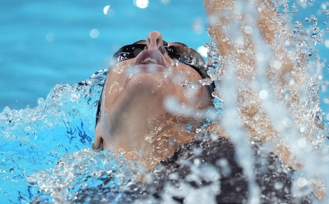 Margherita Panziera, of Italy, competes in her heat of the women's 200-meter backstroke at the 2024 Summer Olympics, Thursday, Aug. 1, 2024, in Nanterre, France. (AP Photo/Matthias Schrader)