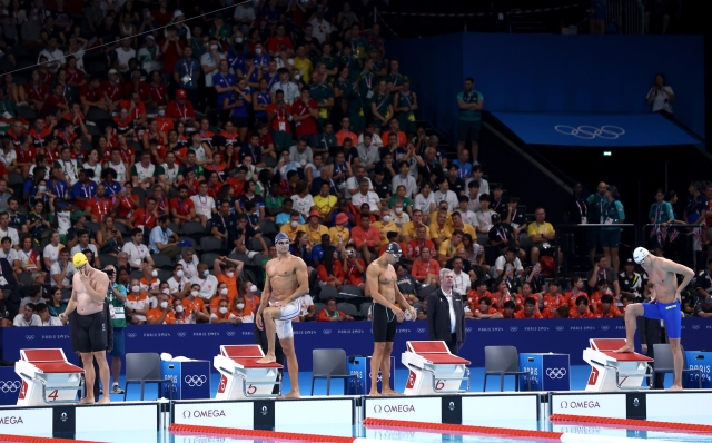 NANTERRE, FRANCE - AUGUST 01: Cameron McEvoy of Team Australia, Florent Manaudou of Team France, Leonardo Deplano of Team Italy and Vladyslav Bukhov of Team Ukraine preparing to compete in the Men's 50m Freestyle Semifinals on day six of the Olympic Games Paris 2024 at Paris La Defense Arena on August 01, 2024 in Nanterre, France. (Photo by Maddie Meyer/Getty Images)