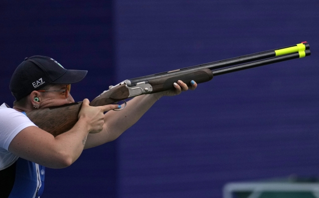 Italy's Martina Bartolomei competes in the Skeet women's qualification round at the 2024 Summer Olympics, Saturday, Aug. 3, 2024, in Chateauroux, France. (AP Photo/Manish Swarup)