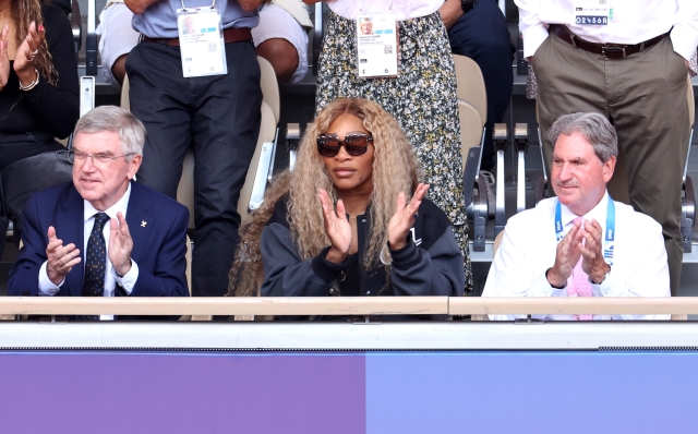 PARIS, FRANCE - AUGUST 04: Thomas Bach, Serena Williams and David Haggerty attend the Men's Singles Gold medal match between Carlos Alcaraz of Team Spain and Novak Djokovic of Team Serbia on day nine of the Olympic Games Paris 2024 at Roland Garros on August 04, 2024 in Paris, France. (Photo by Arturo Holmes/Getty Images)